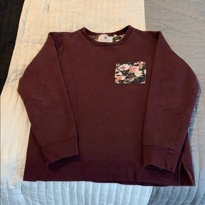 On the Byas crewneck sweatshirt